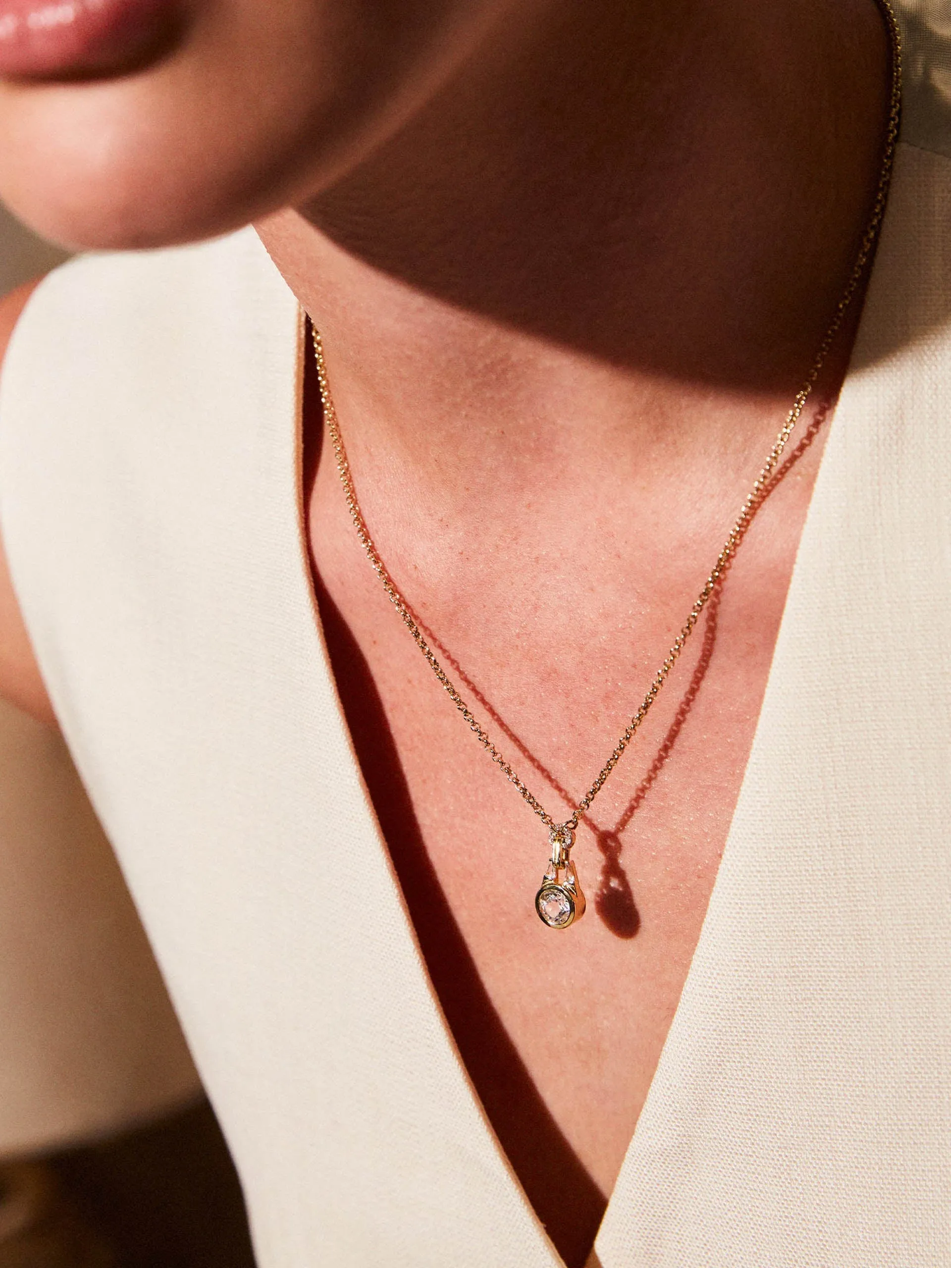 Gold Olive necklace with white topaz
