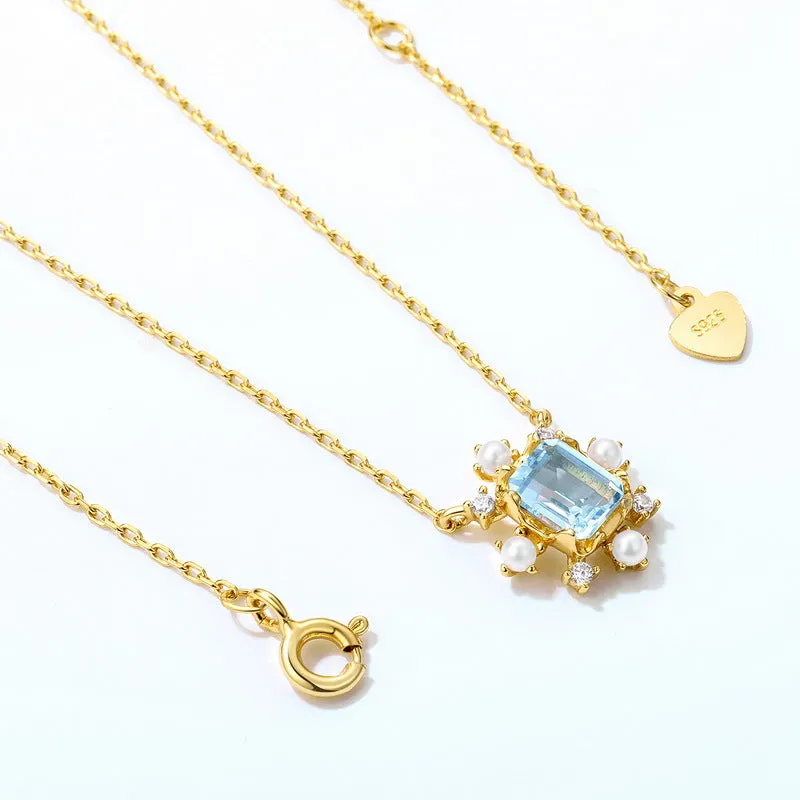 Pearl Blue Topaz Snowflake Necklace